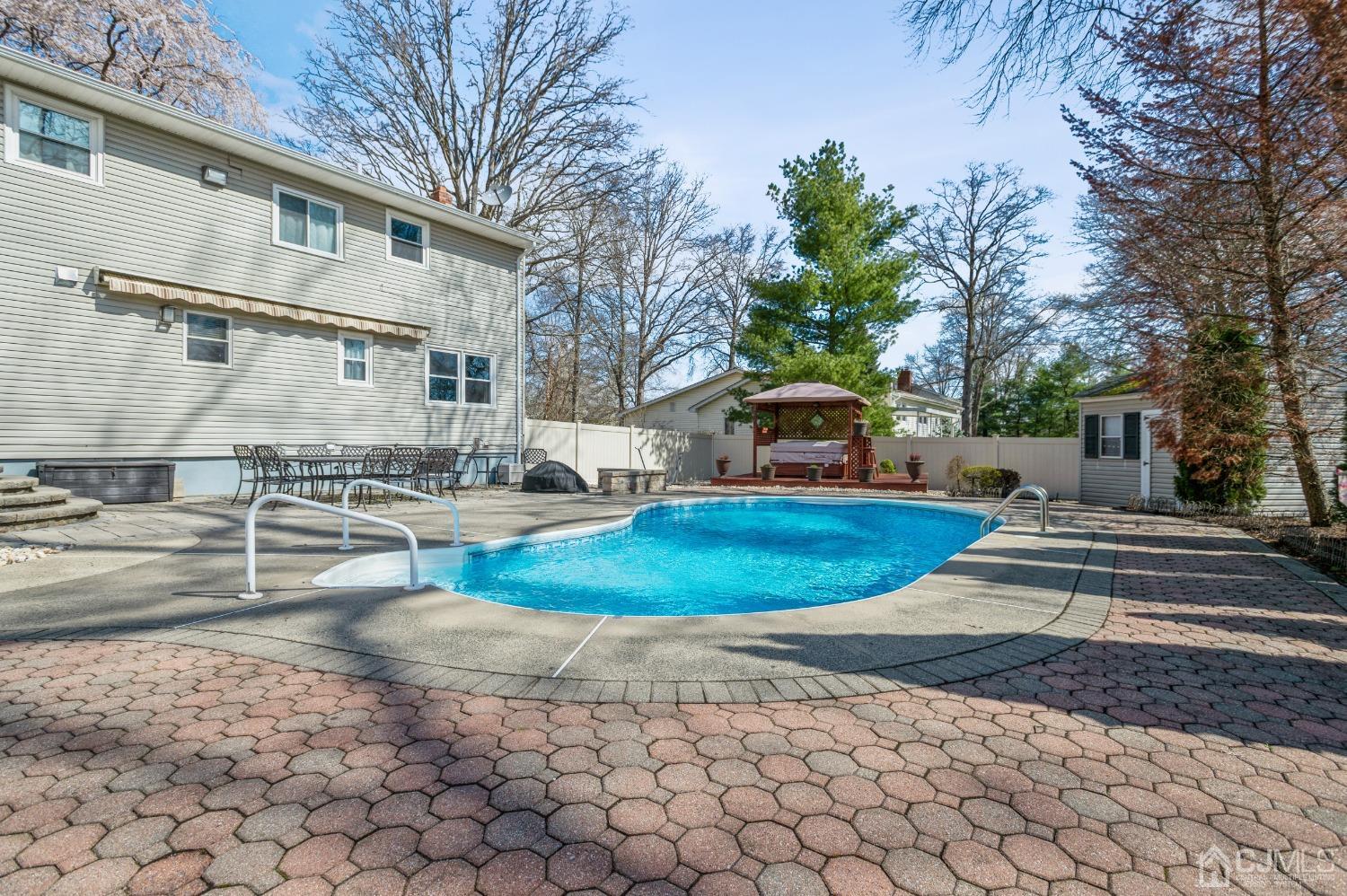 11 Boxwood Road Piscataway, NJ 08854 - Photo 26 of 28 a view of a yard with white house