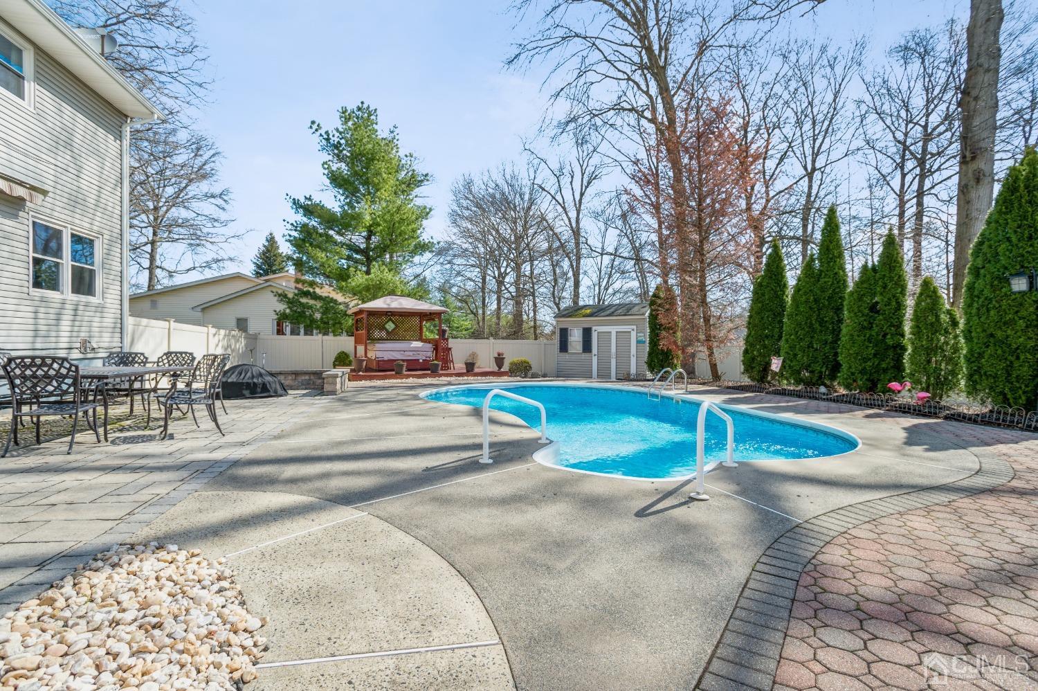 11 Boxwood Road Piscataway, NJ 08854 - Photo 27 of 28 a view of a house with swimming pool and sitting area