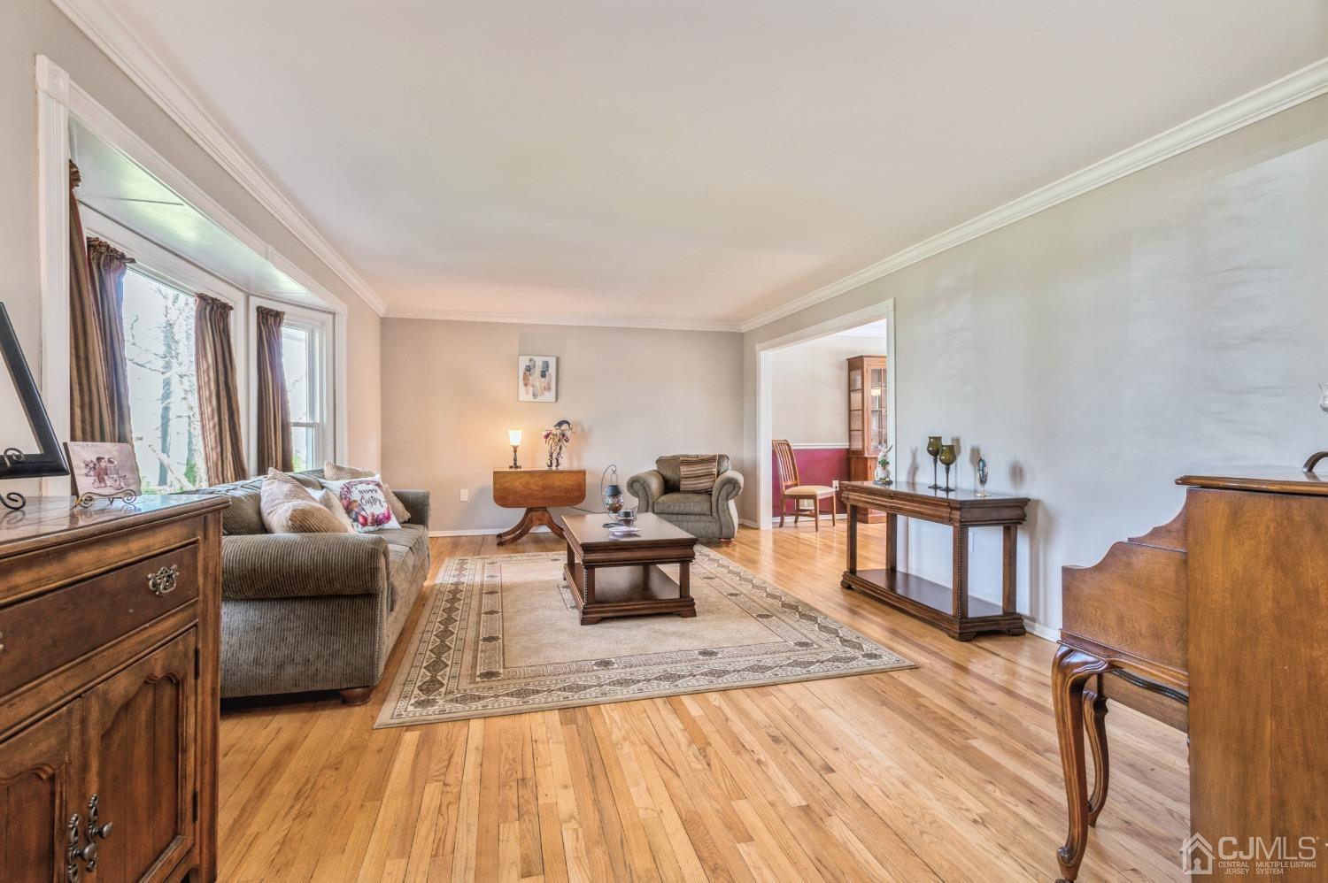11 Boxwood Road Piscataway, NJ 08854 - Photo 4 of 28 a living room with furniture and a wooden floor