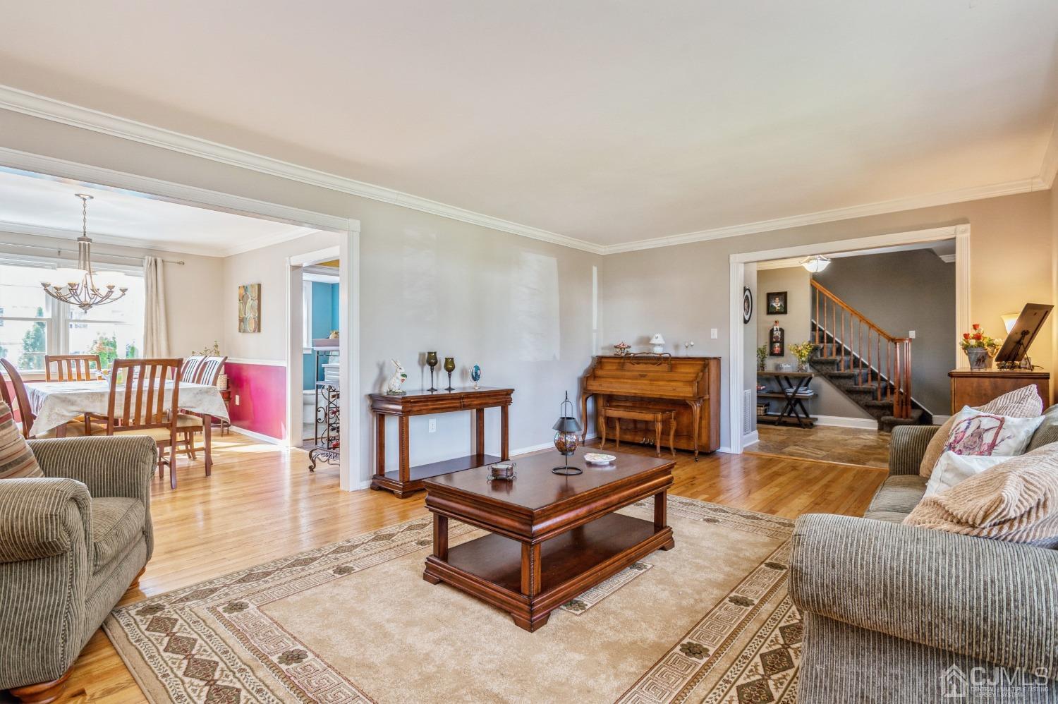 11 Boxwood Road Piscataway, NJ 08854 - Photo 5 of 28 a living room with furniture and a wooden floor