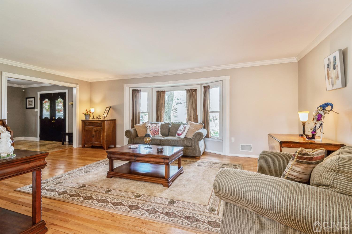 11 Boxwood Road Piscataway, NJ 08854 - Photo 6 of 28 a living room with furniture and wooden floor