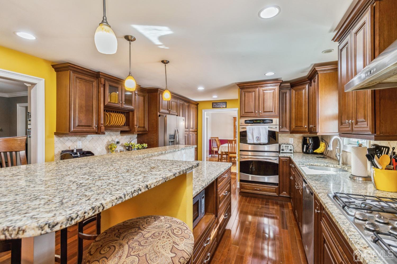 11 Boxwood Road Piscataway, NJ 08854 - Photo 8 of 28 a kitchen with a stove sink cabinets and refrigerator