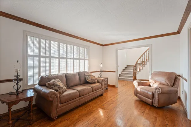 a kitchen with a stove a sink and a refrigerator