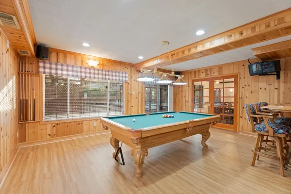 a room with furniture and a wooden floor