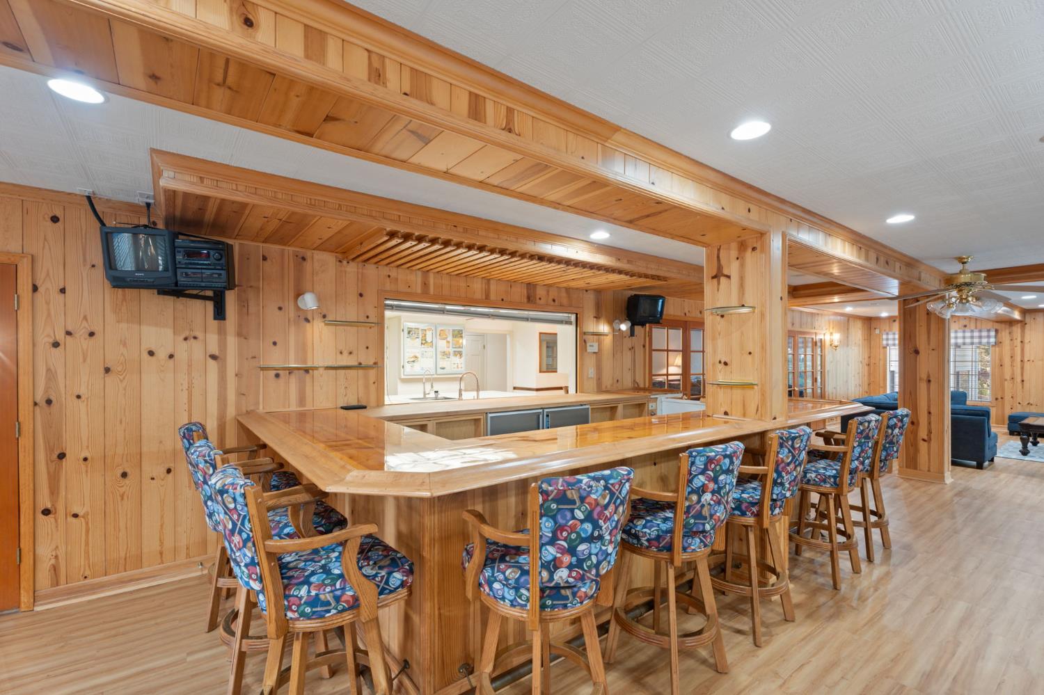 4016 Quartz Drive Santa Rosa, CA 95405 - Photo 23 of 98 a dining hall with stainless steel appliances a dining table and chairs with wooden floor