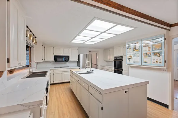 a living room with furniture and window