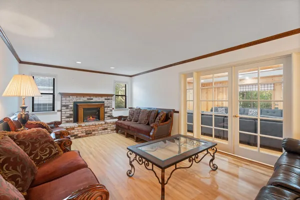 an aerial view of residential houses with outdoor space
