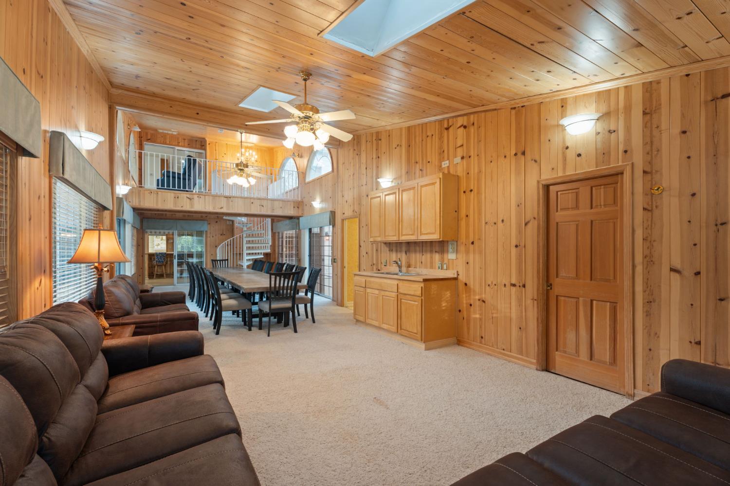 4016 Quartz Drive Santa Rosa, CA 95405 - Photo 41 of 98 a living room with furniture a dining table and chairs