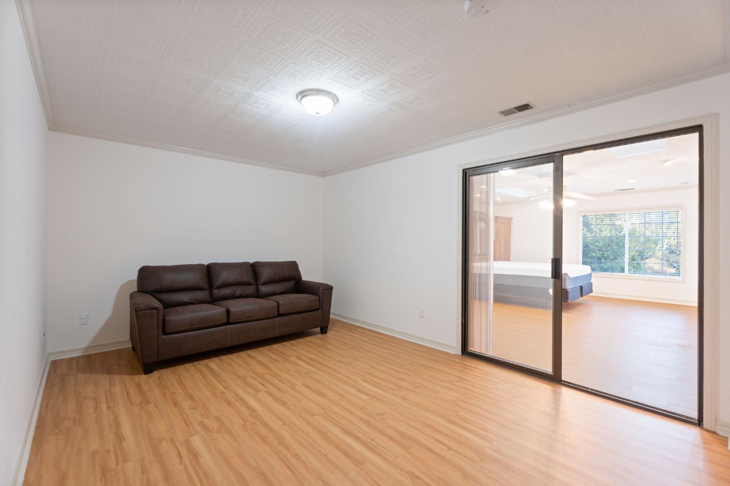 4016 Quartz Drive Santa Rosa, CA 95405 - Photo 50 of 98 a living room with furniture and a large window