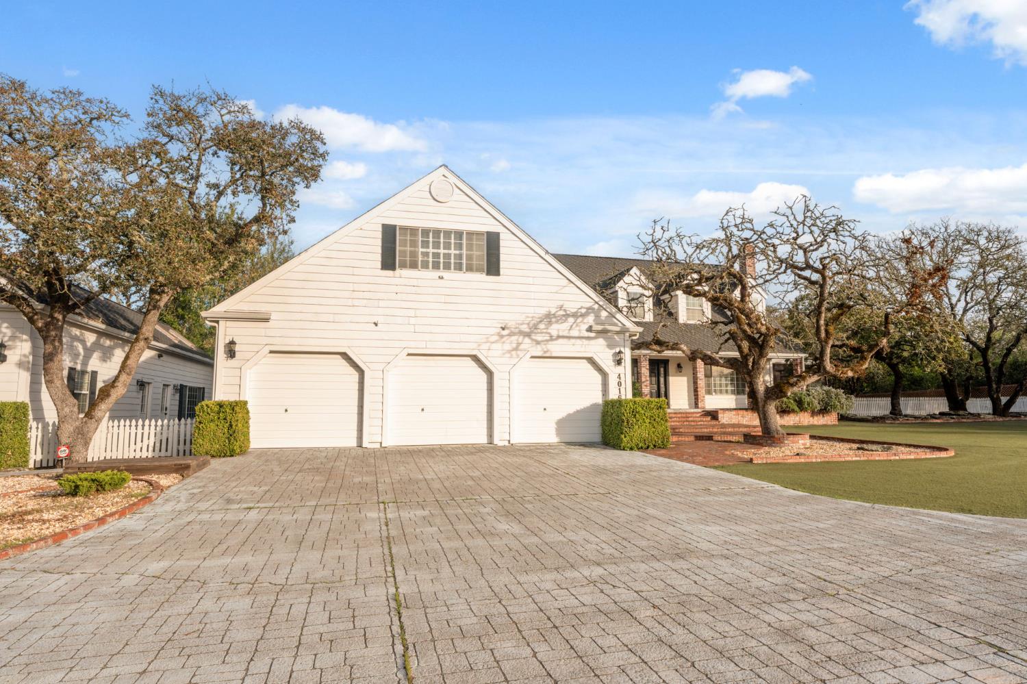 4016 Quartz Drive Santa Rosa, CA 95405 - Photo 5 of 98 a view of a white house with a yard