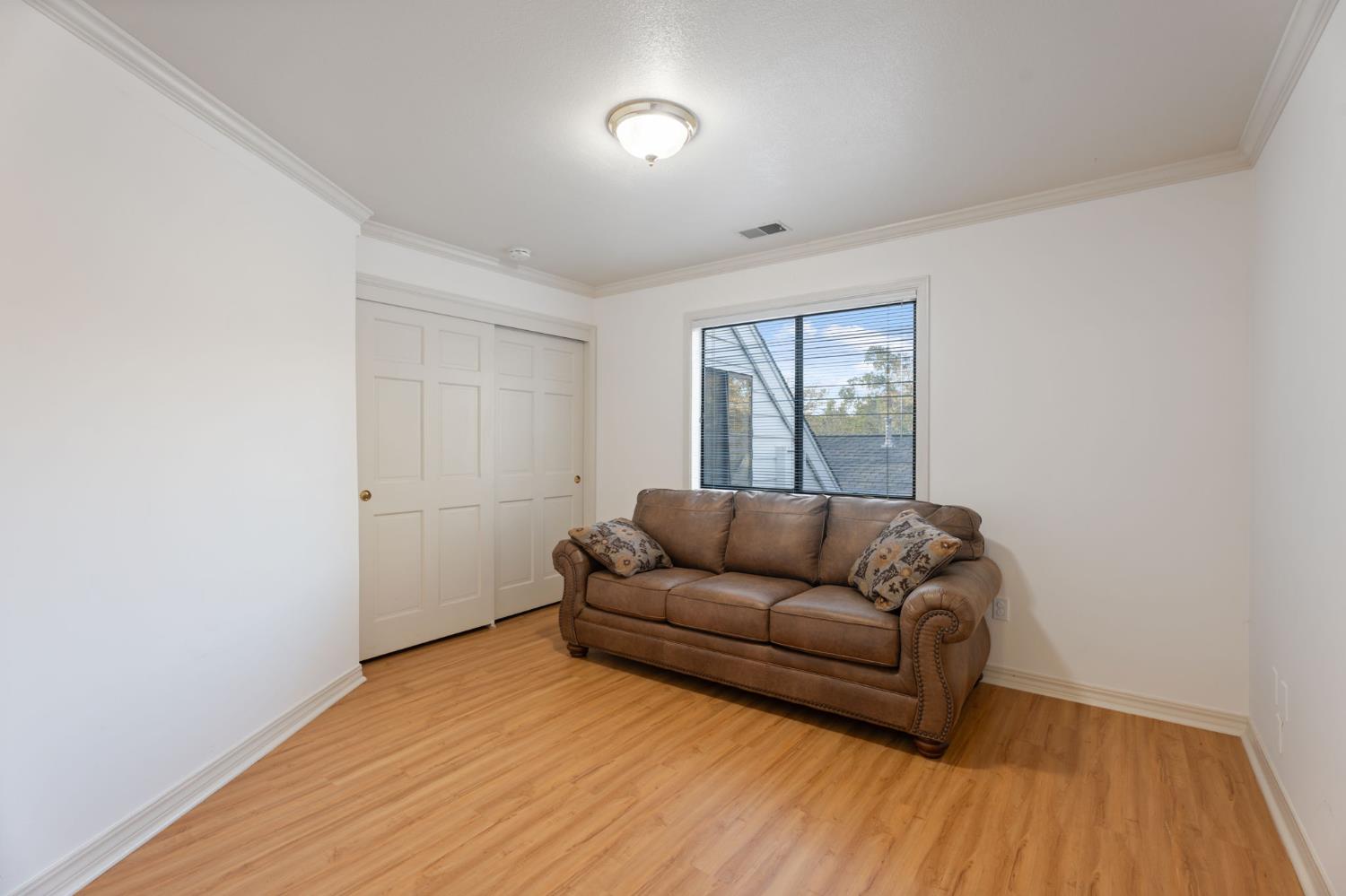 4016 Quartz Drive Santa Rosa, CA 95405 - Photo 51 of 98 a living room with furniture and a wooden floor