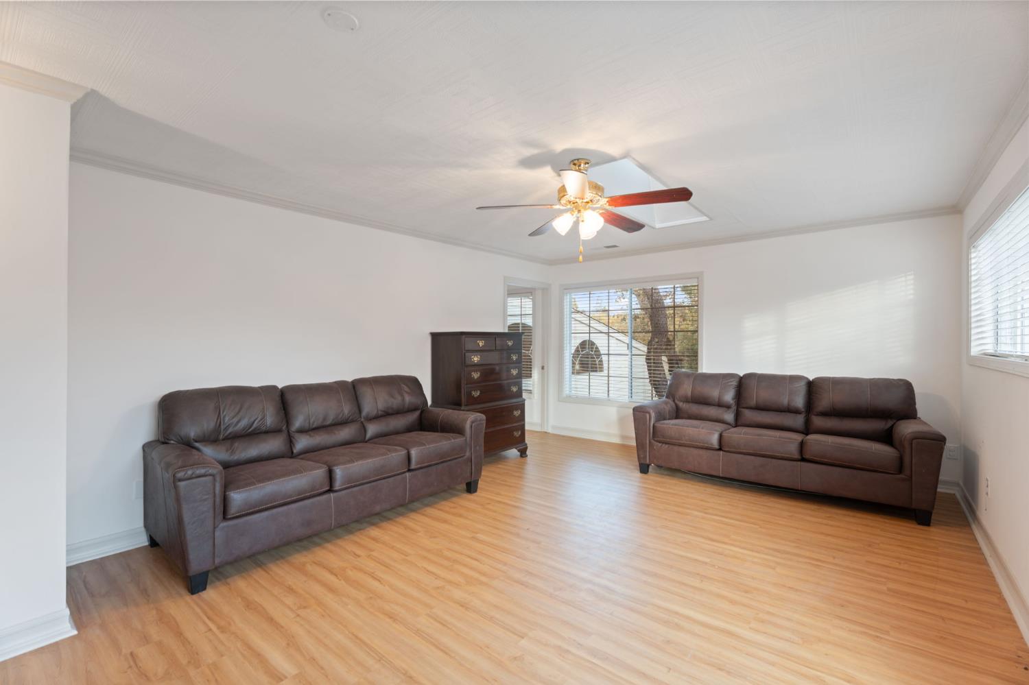 4016 Quartz Drive Santa Rosa, CA 95405 - Photo 62 of 98 a living room with furniture and a wooden floor