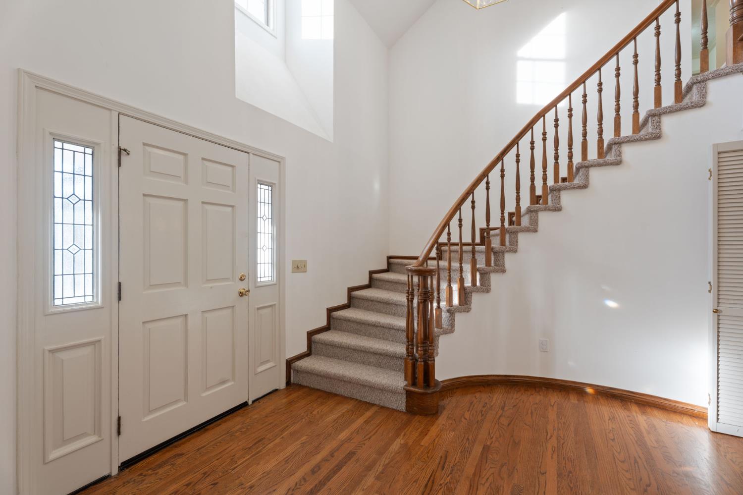 4016 Quartz Drive Santa Rosa, CA 95405 - Photo 7 of 98 a view of an entryway with wooden floor and staircase
