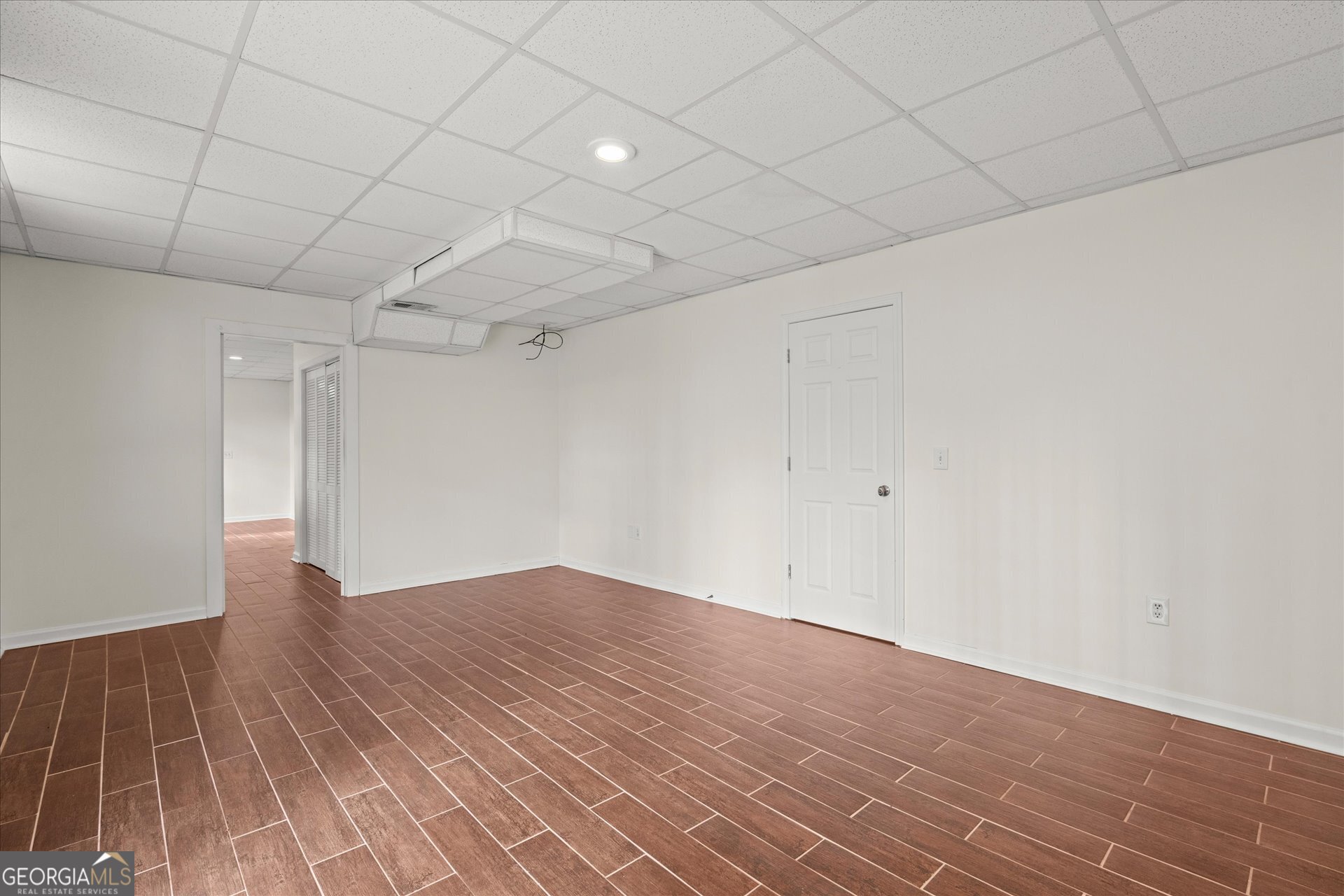 401 Tapley Road Villa Rica, GA 30180 - Photo 31 of 42 a view of empty room with wooden floor