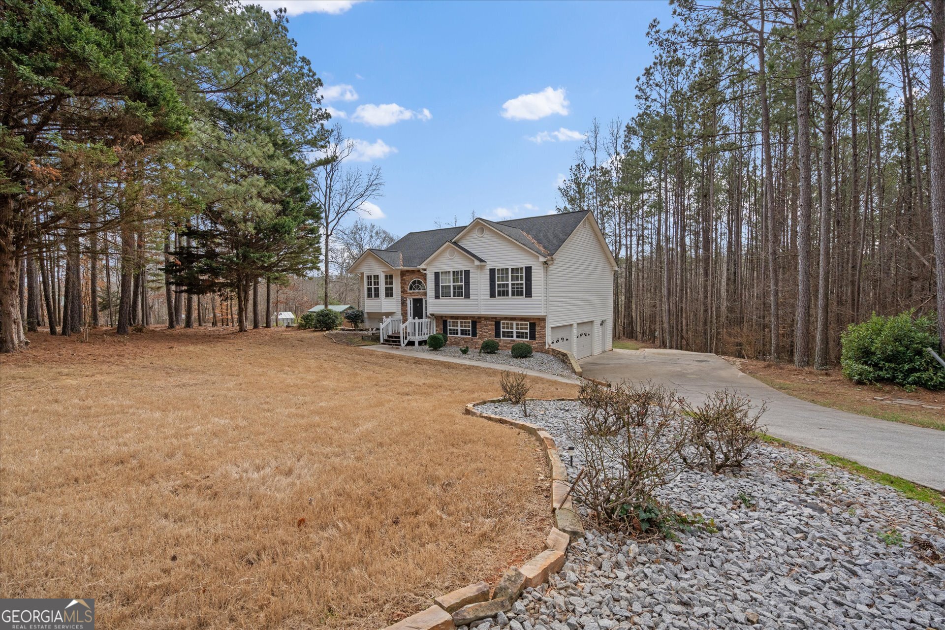401 Tapley Road Villa Rica, GA 30180 - Photo 4 of 42 a view of a house with a snow in a yard