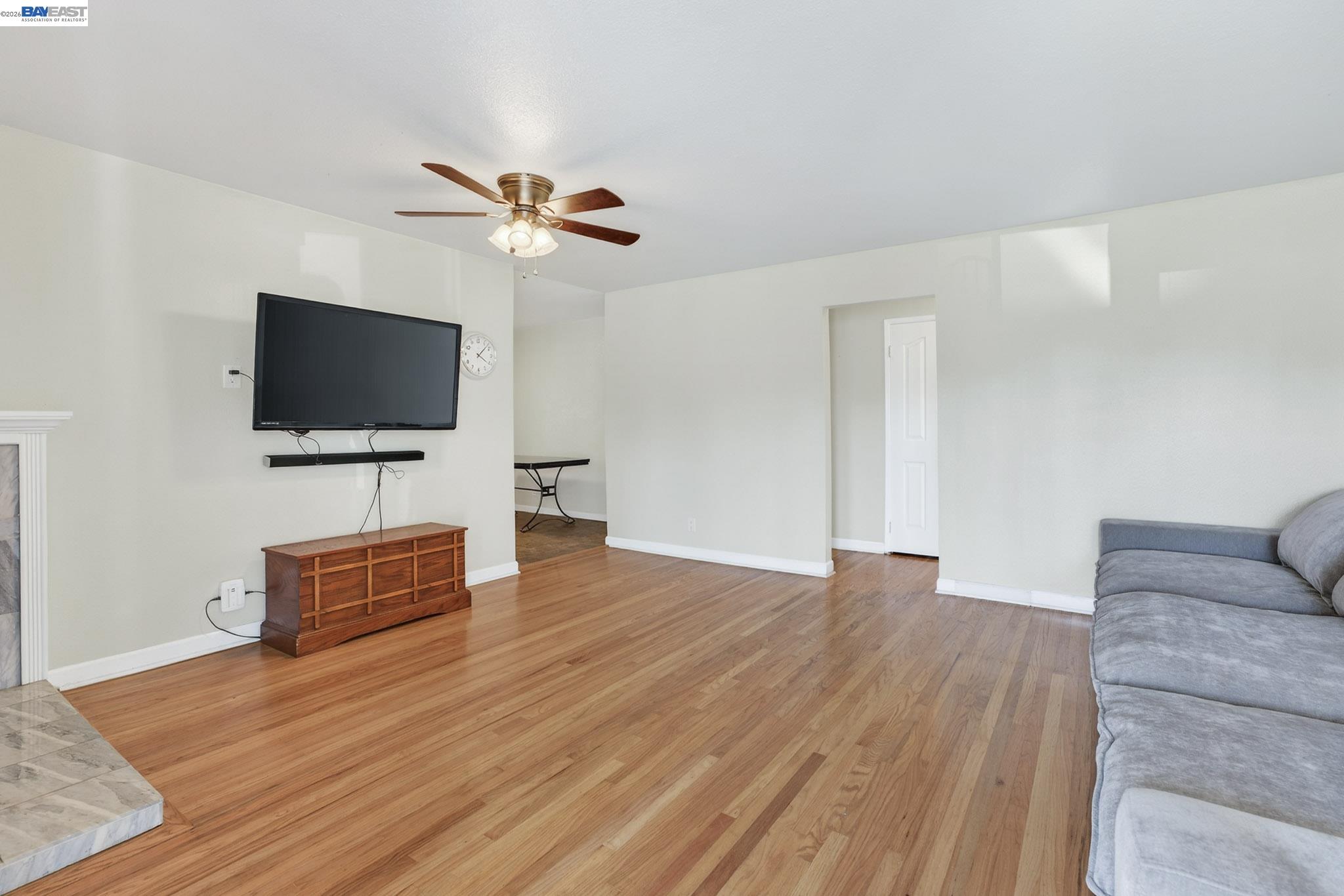 6759 Albyn Court Newark, CA 94560 - Photo 3 of 23 a living room with furniture and a flat screen tv