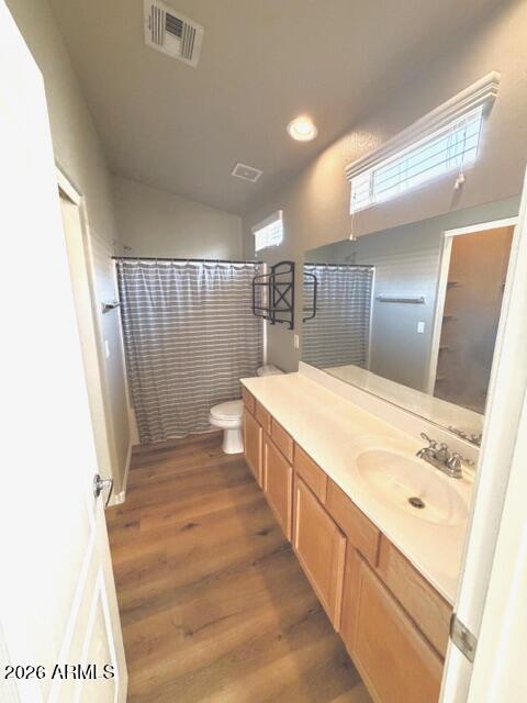 2150 West Alameda Road, Unit 2287 Phoenix, AZ 85085 - Photo 6 of 7 a spacious bathroom with a sink a mirror and a shower