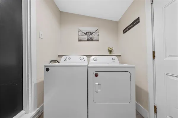 a utility room with dryer and washer