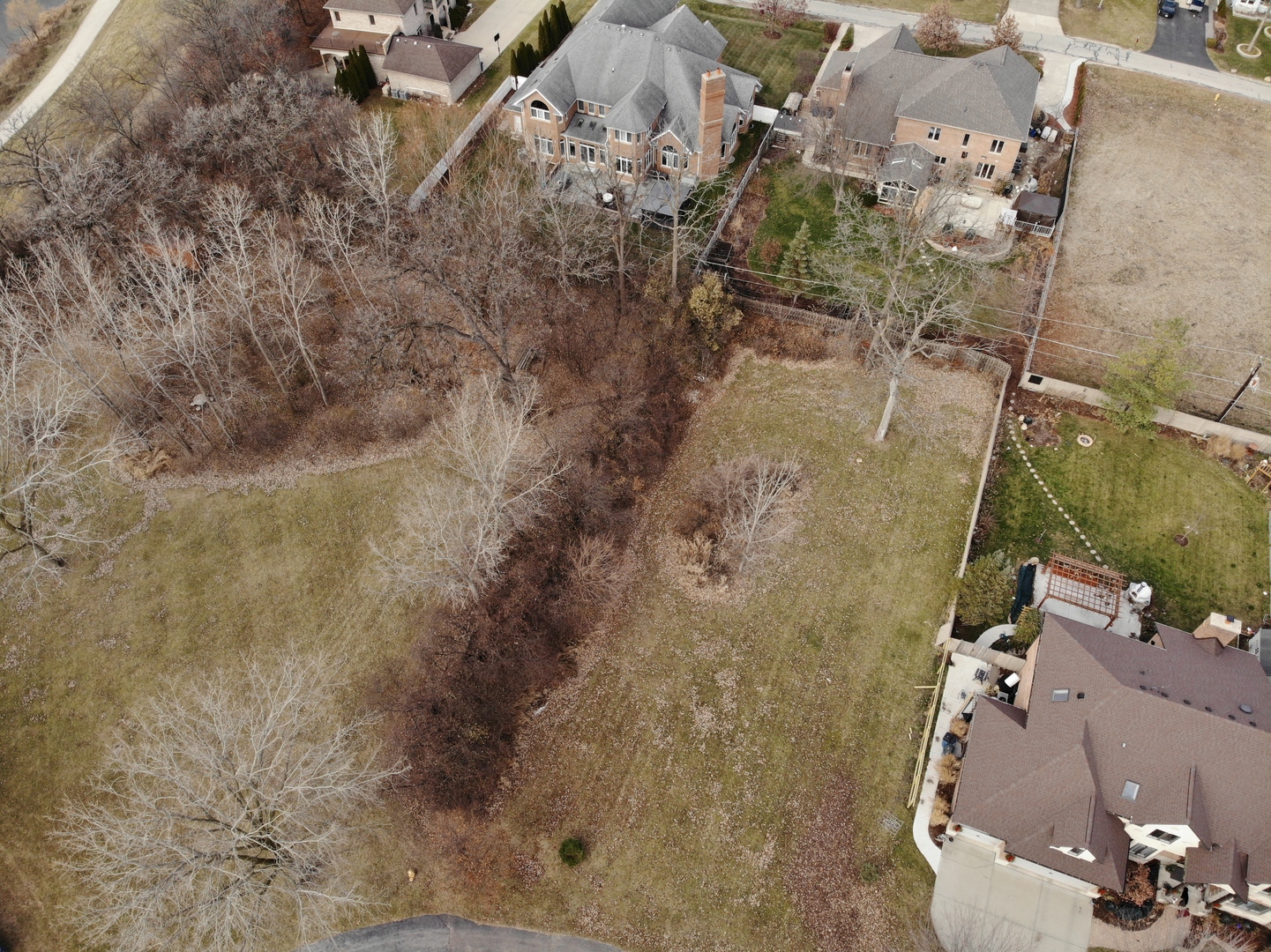 692 White Pine Road Addison, IL 60101 - Photo 3 of 5 an aerial view of a house with a yard