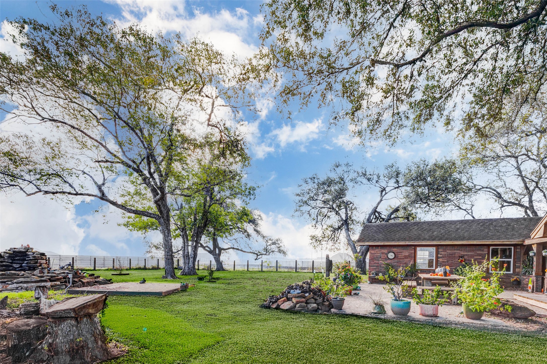 8412 Katy Hockley Road Katy, TX 77493 - Photo 11 of 36 a front view of a house with a garden and trees