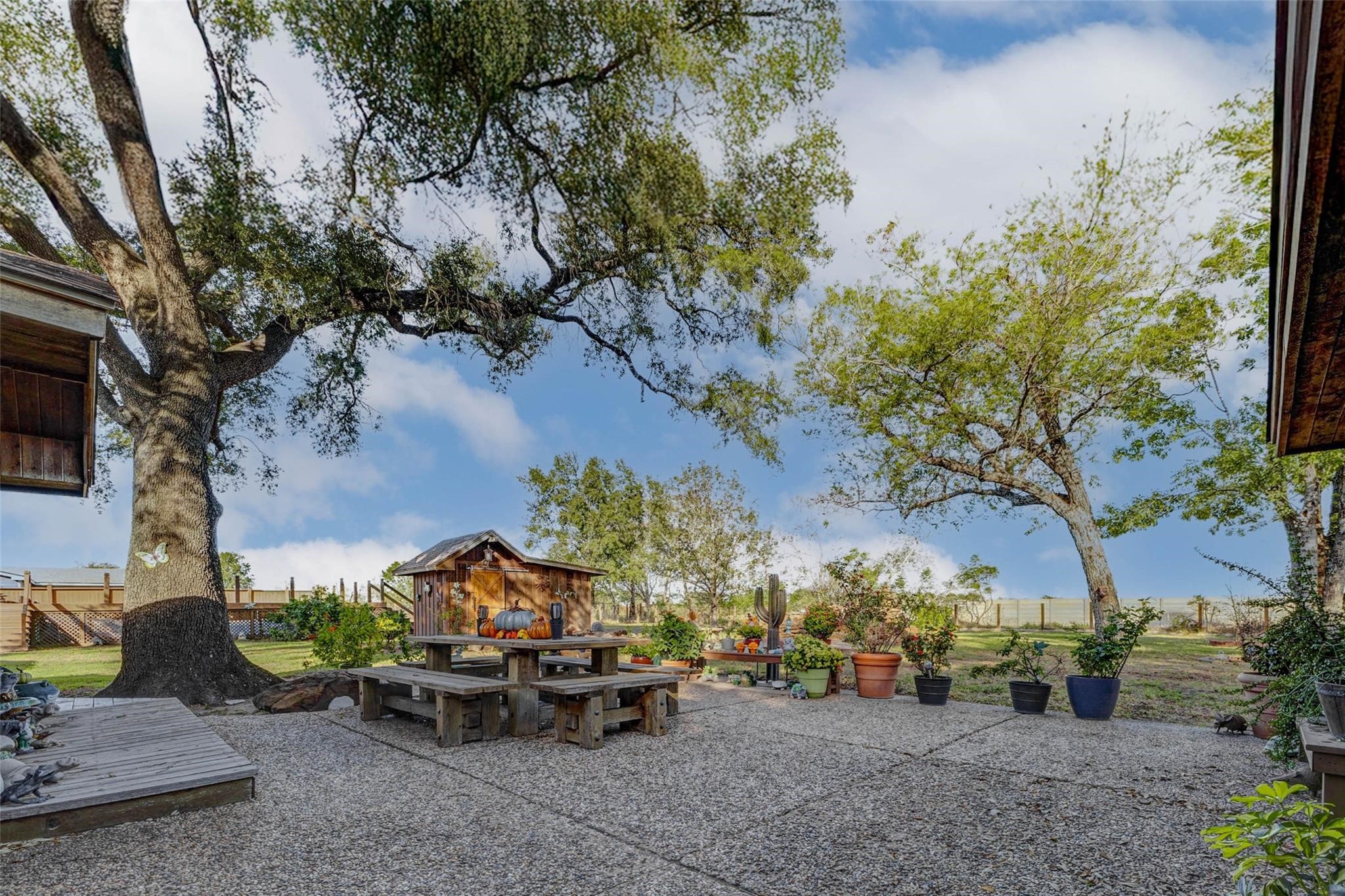 8412 Katy Hockley Road Katy, TX 77493 - Photo 19 of 36 a backyard of a house with table and chairs