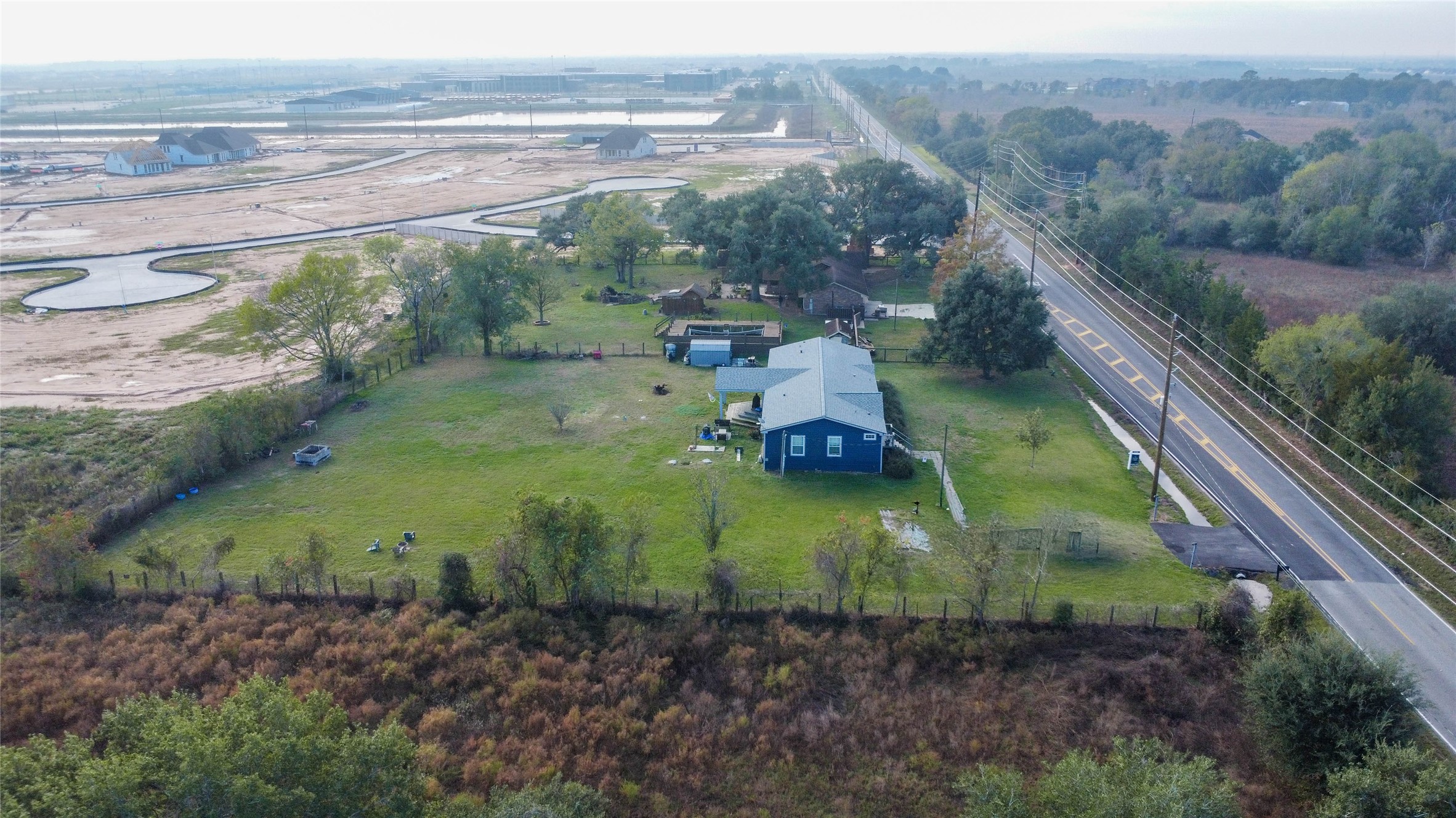 8412 Katy Hockley Road Katy, TX 77493 - Photo 22 of 36 a view of a wooden bridge
