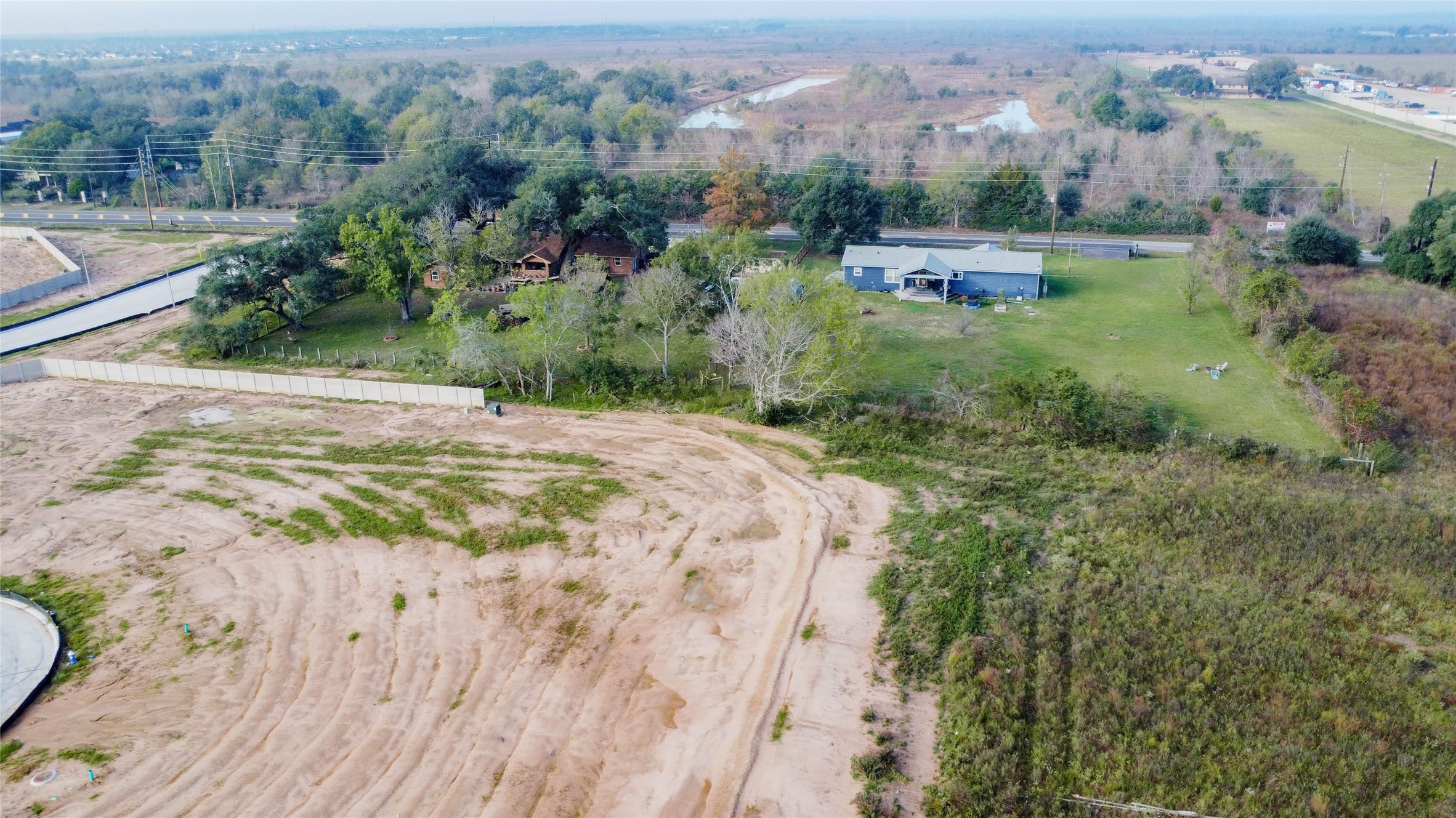 8412 Katy Hockley Road Katy, TX 77493 - Photo 30 of 36 an aerial view of residential houses with outdoor space and trees