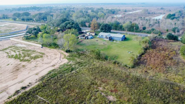 a view of a town with mountains in the background