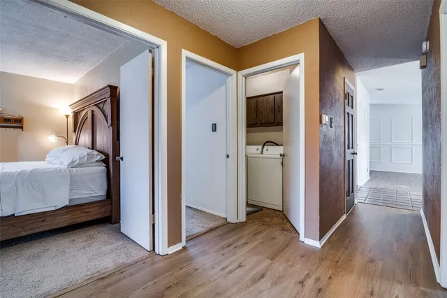 a view of a bedroom from a hallway