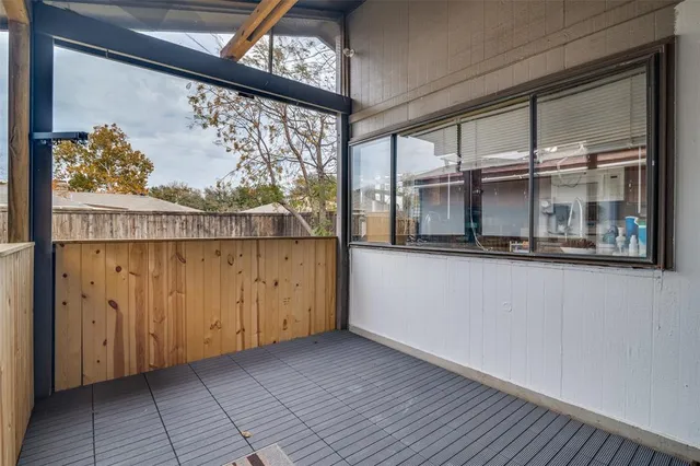 a view of a large window with an outdoor space