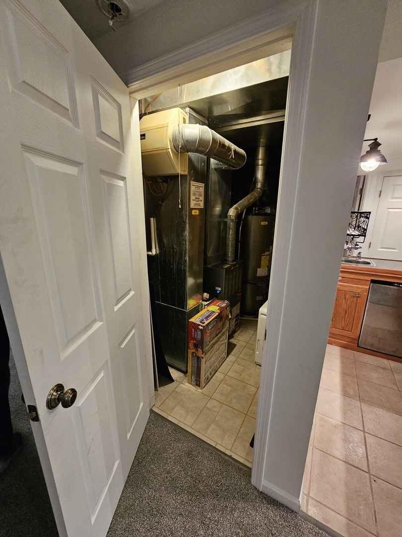847 Teasel Lane Aurora, IL 60504 - Photo 44 of 46 a view of storage and utility room