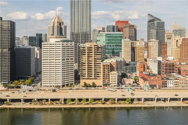 a view of a city with tall buildings