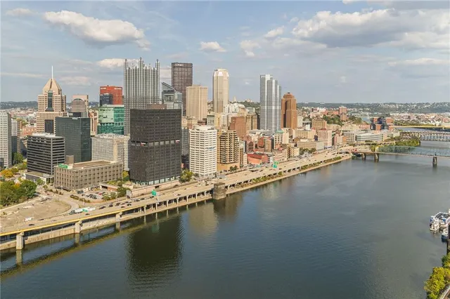 a view of a city with tall buildings