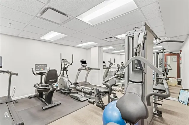 a backyard of a house with outdoor seating