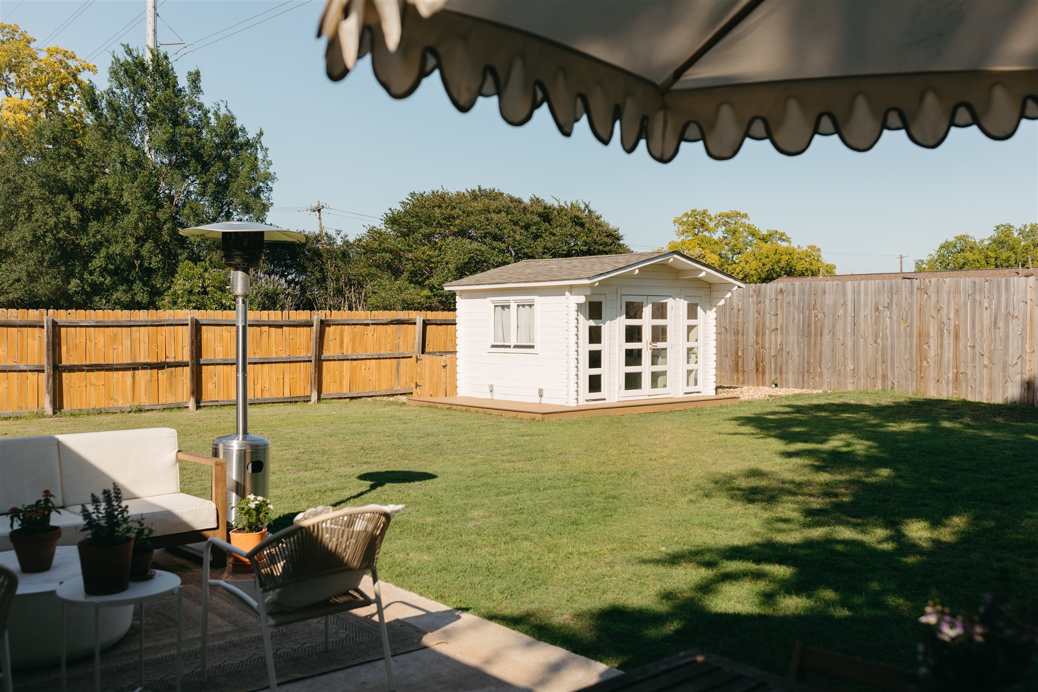 506 Central Drive Georgetown, TX 78628 - Photo 14 of 29 a view of a patio with table and chairs potted plants