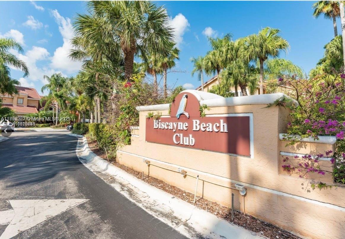 a view of a street with a building in the background