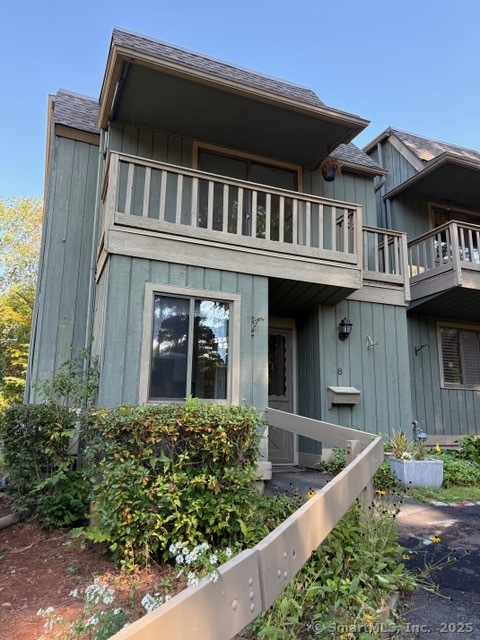 8 Village Road, Unit 8 Southington, CT 06489 - Photo 1 of 25 front view of a house with a small yard