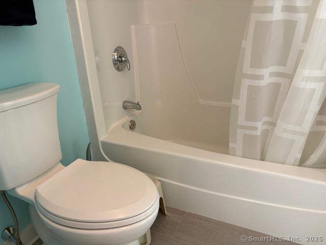 8 Village Road, Unit 8 Southington, CT 06489 - Photo 12 of 25 a bathroom with a toilet and a bath tub