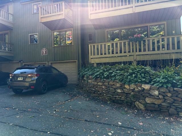 8 Village Road, Unit 8 Southington, CT 06489 - Photo 20 of 25 a view of a porch with a yard