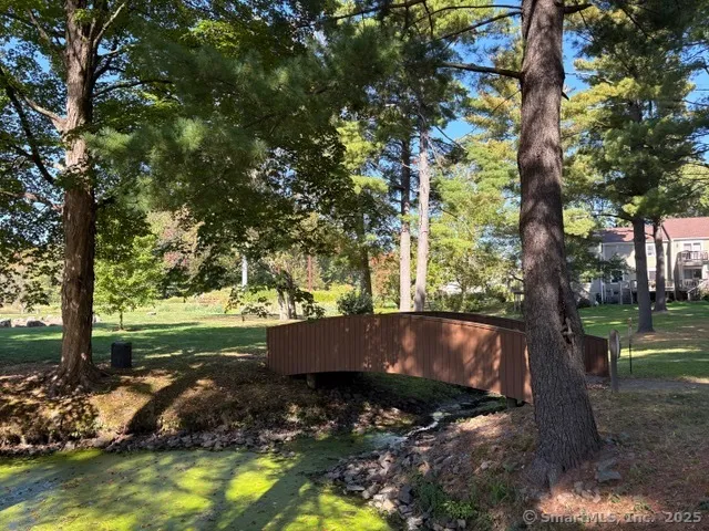 a view of swimming pool with a yard