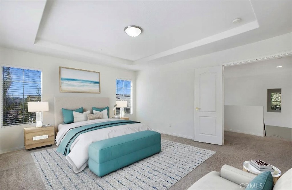 12 Avenida Reflexion San Clemente, CA 92673 - Photo 15 of 42 a bedroom with a bed and a couch