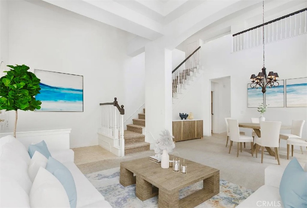 12 Avenida Reflexion San Clemente, CA 92673 - Photo 19 of 42 a living room with furniture and a potted plant