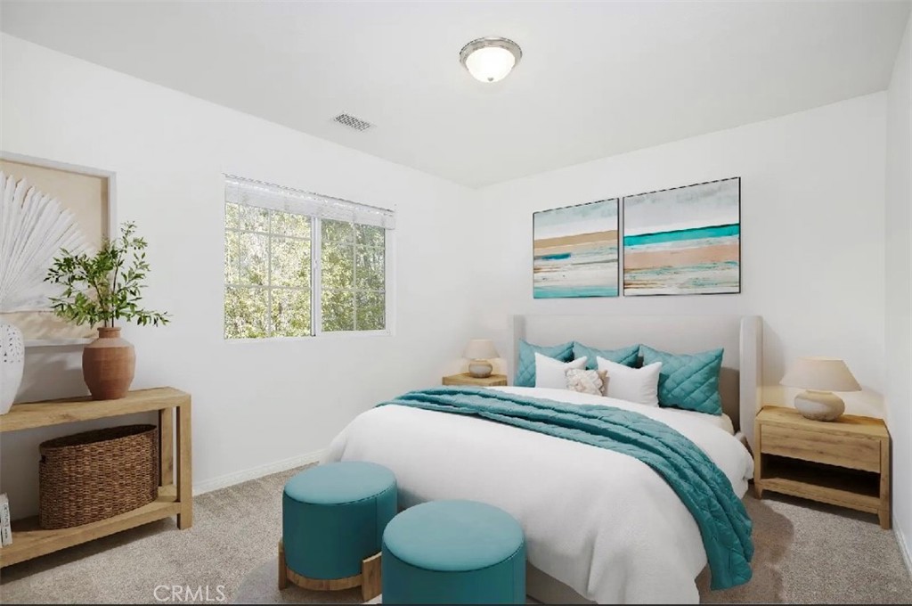 12 Avenida Reflexion San Clemente, CA 92673 - Photo 26 of 42 a bedroom with a bed and a fireplace