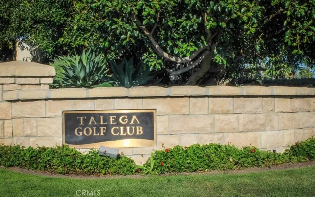 a sign broad in front of a building