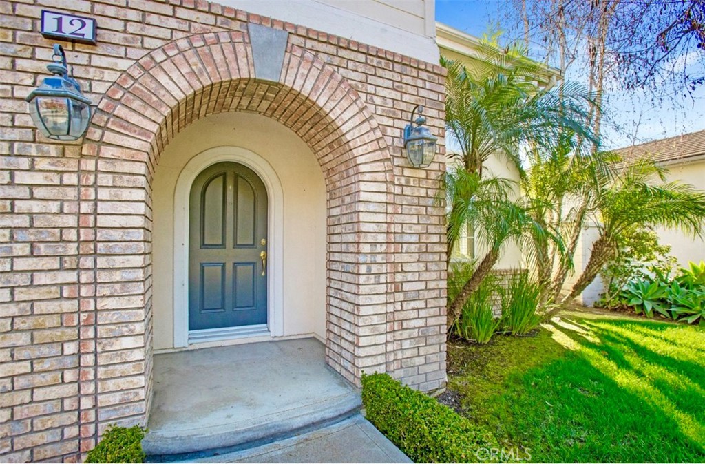 12 Avenida Reflexion San Clemente, CA 92673 - Photo 3 of 42 a view of a house with a garden