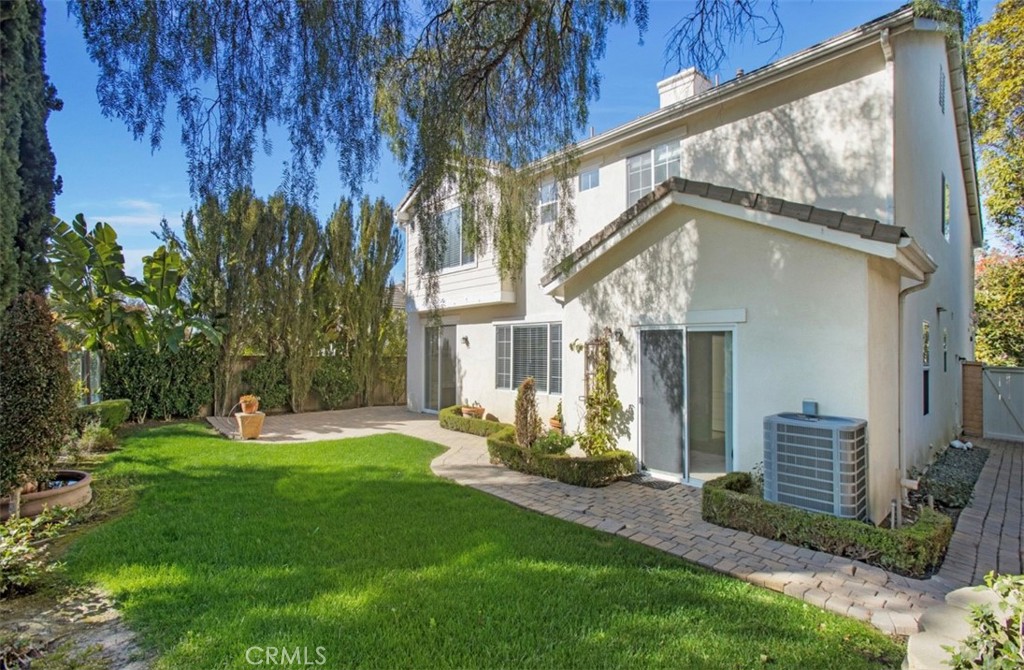 12 Avenida Reflexion San Clemente, CA 92673 - Photo 34 of 42 a front view of a house with a yard and trees
