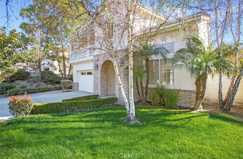 12 Avenida Reflexion San Clemente, CA 92673 - Photo 38 of 42 a front view of house with yard and green space