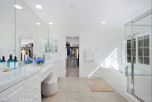 a view of a living room and entryway