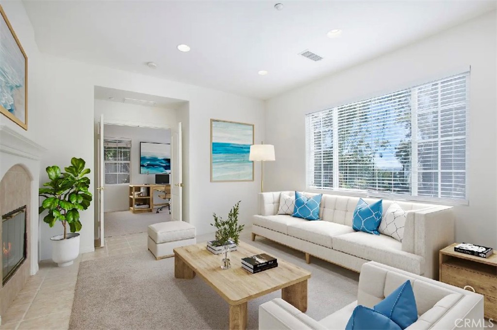 12 Avenida Reflexion San Clemente, CA 92673 - Photo 7 of 42 a living room with furniture and a large window