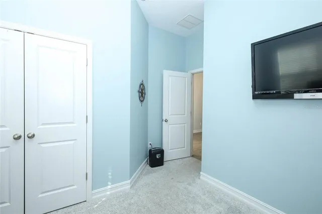 a view of a livingroom with a flat screen tv